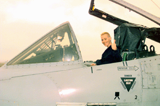 Joan gives the thumbs-up from cockpit of an A-10